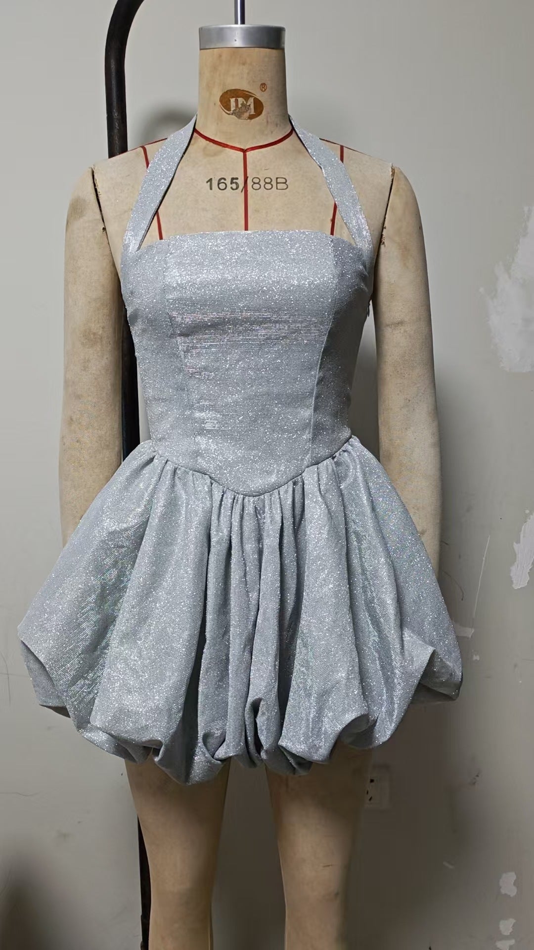 Elegant Sequin Halterneck Dress, secure neckline for a sophisticated look, Sequin Embellishment: Sparkling bead details for a glamorous appearance. 
Lined Interior: High-quality fabric lining for comfort and durability.